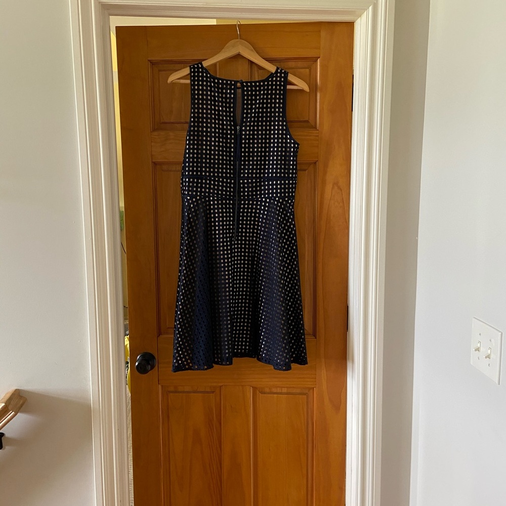 Loft black eyelet with tan liner.